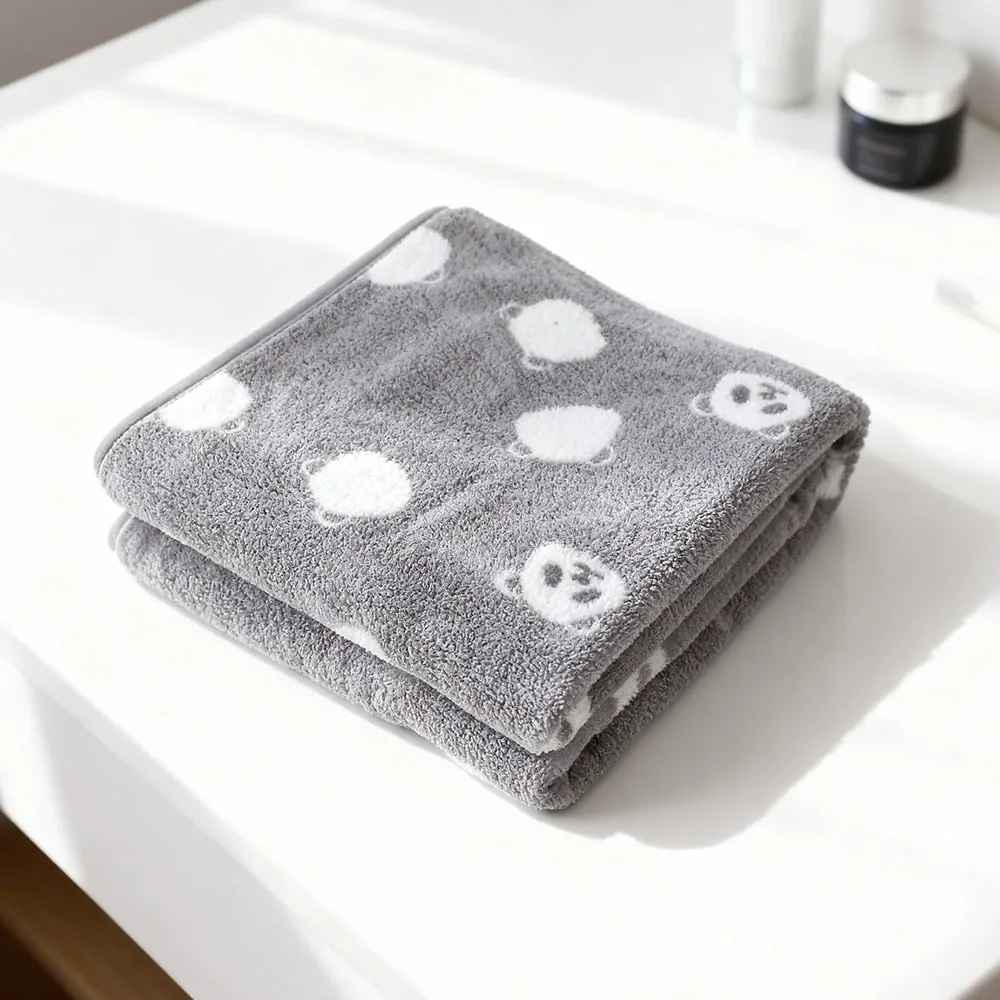 Folded patterned kids' bath towel